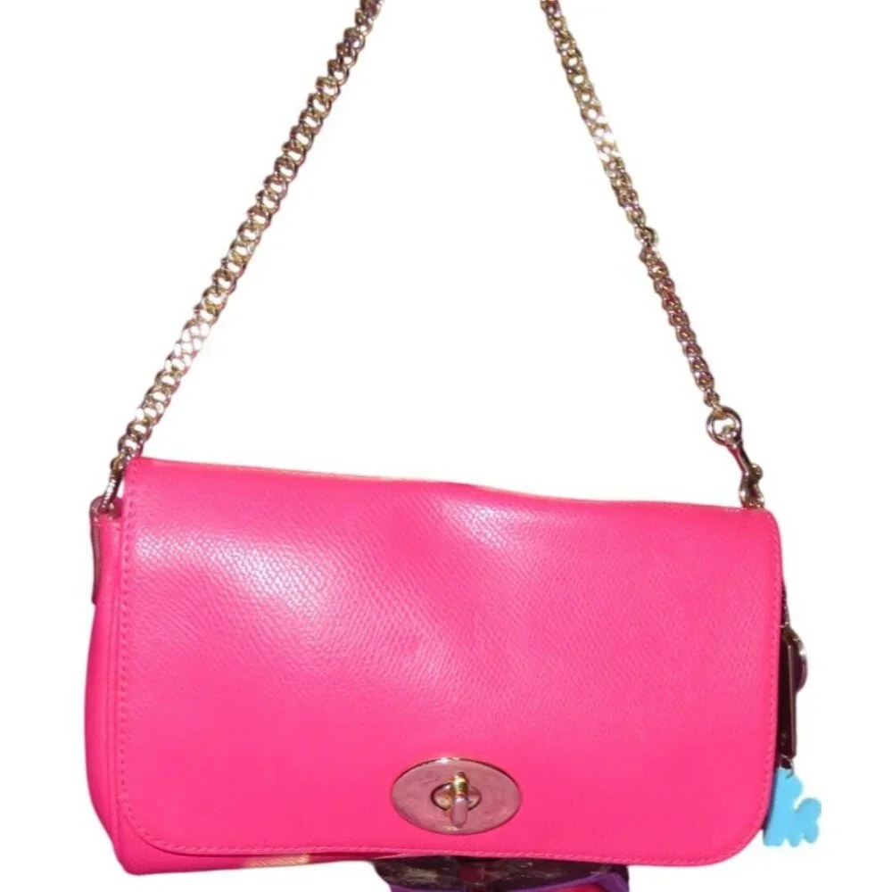 Coach Pink Cross grain Leather Mini Ruby Turn Lock Crossbody Handbag